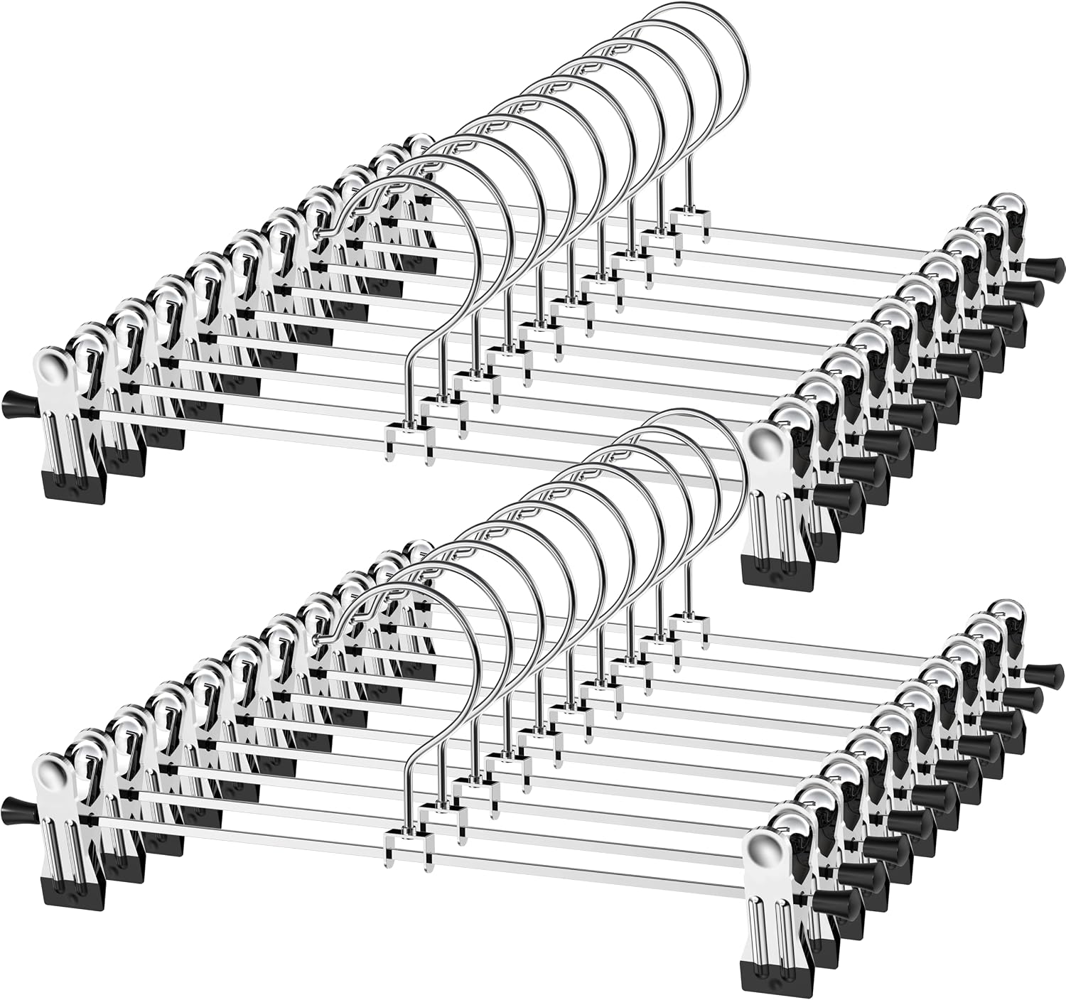 Clip hangers holding pants by the waistband on a closet rod